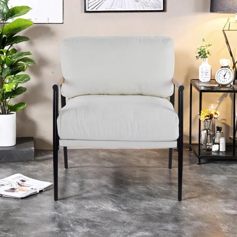 Fauteuil d'appoint rembourré, structure en métal noir, accoudoirs en bois, assise coussin rembourrée