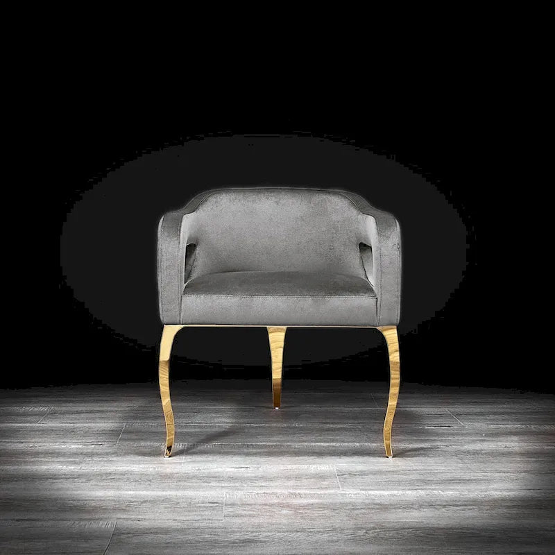 Chaise de salle à manger capitonnée en velours avec pieds en acier inoxydable doré