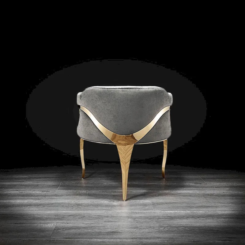 Chaise de salle à manger capitonnée en velours avec pieds en acier inoxydable doré