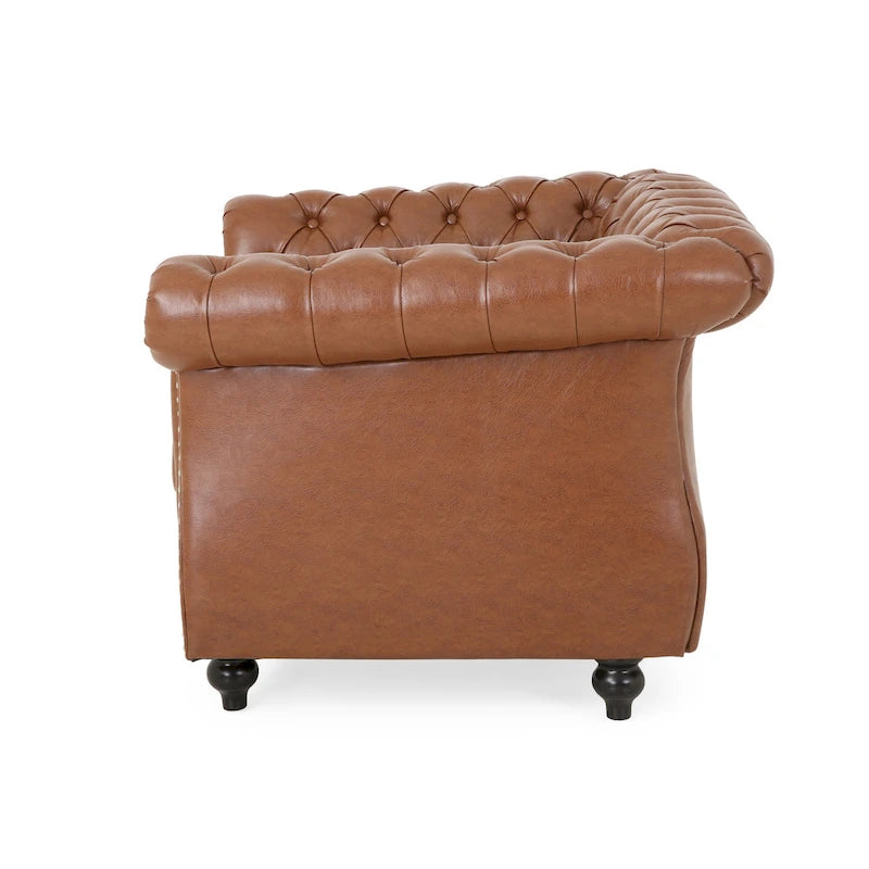 Fauteuil club Chesterfield capitonné en similicuir marron cognac avec clous décoratifs