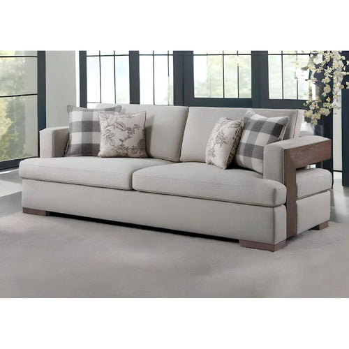 Canapé en tissu beige avec accoudoirs droits et pieds en bois massif marron