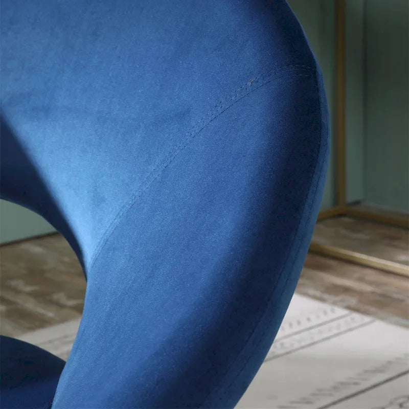 Fauteuil d'appoint rond en velours avec piètement luge en métal doré, vert gris bleu